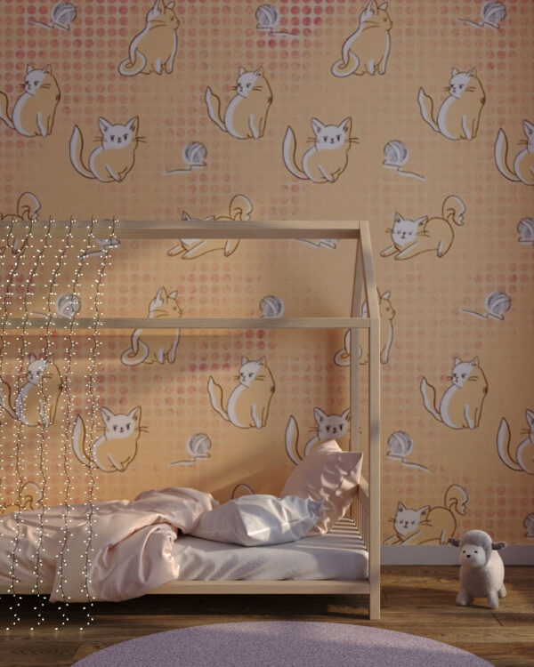 Kittens playing with a ball of yarn patterned wallpaper for a children's room