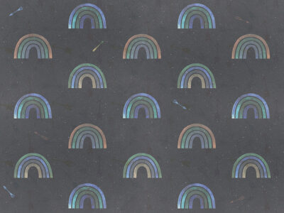 Patterned wallpaper with rainbows and arrows on a dark background