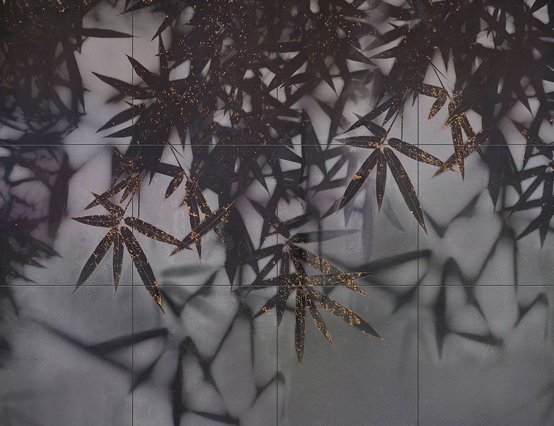 Dark palm leaves wall mural with a touch of gold on a tile