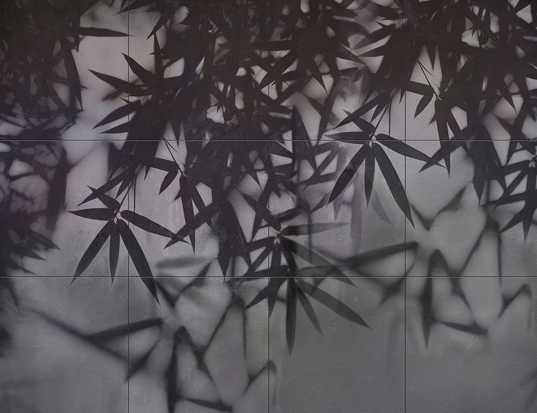 Dark palm leaves on a tile wall mural