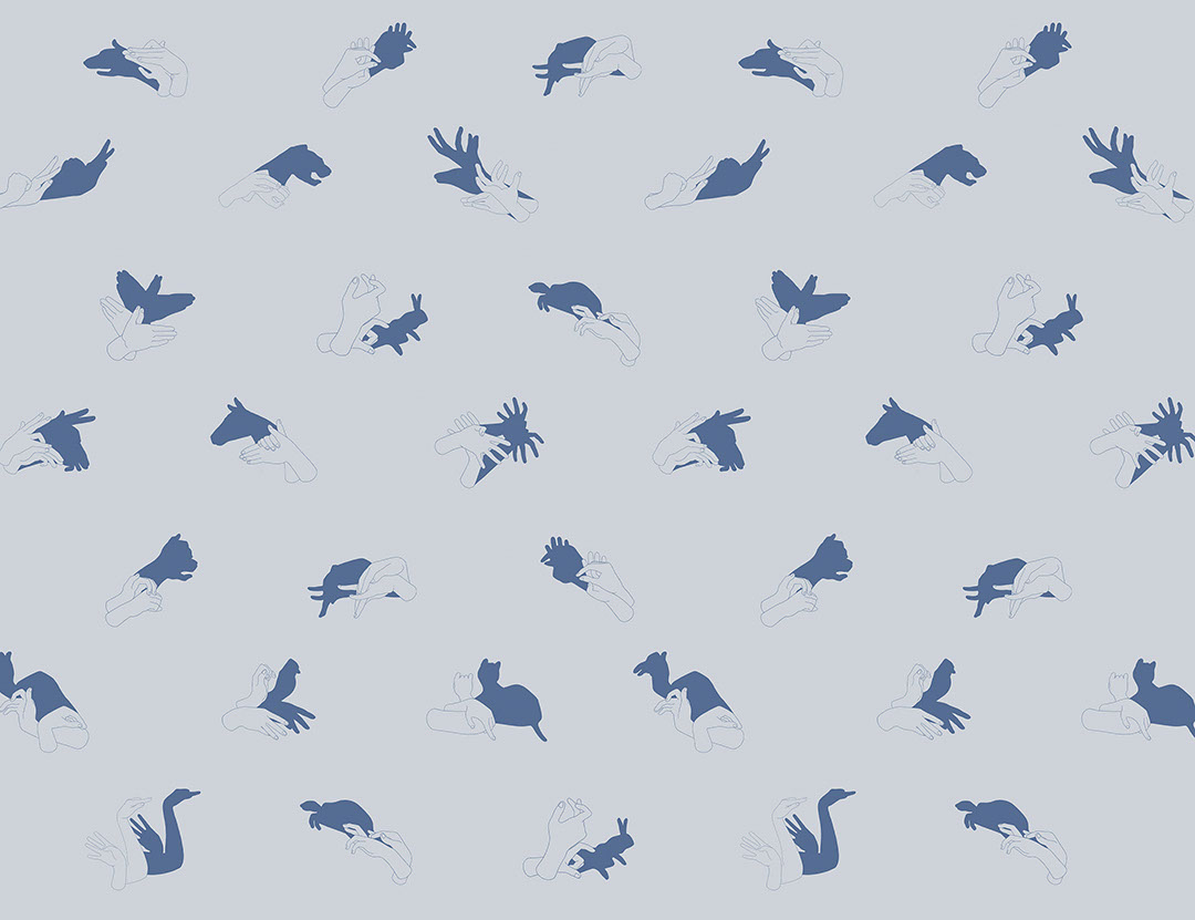 Patterned interactive blue wall mural with hand shadow signs