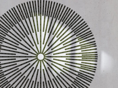 Asymmetric wall mural with a geometric circle on the white background