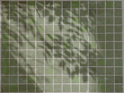 Green stone tiles with leaf shadows wall mural